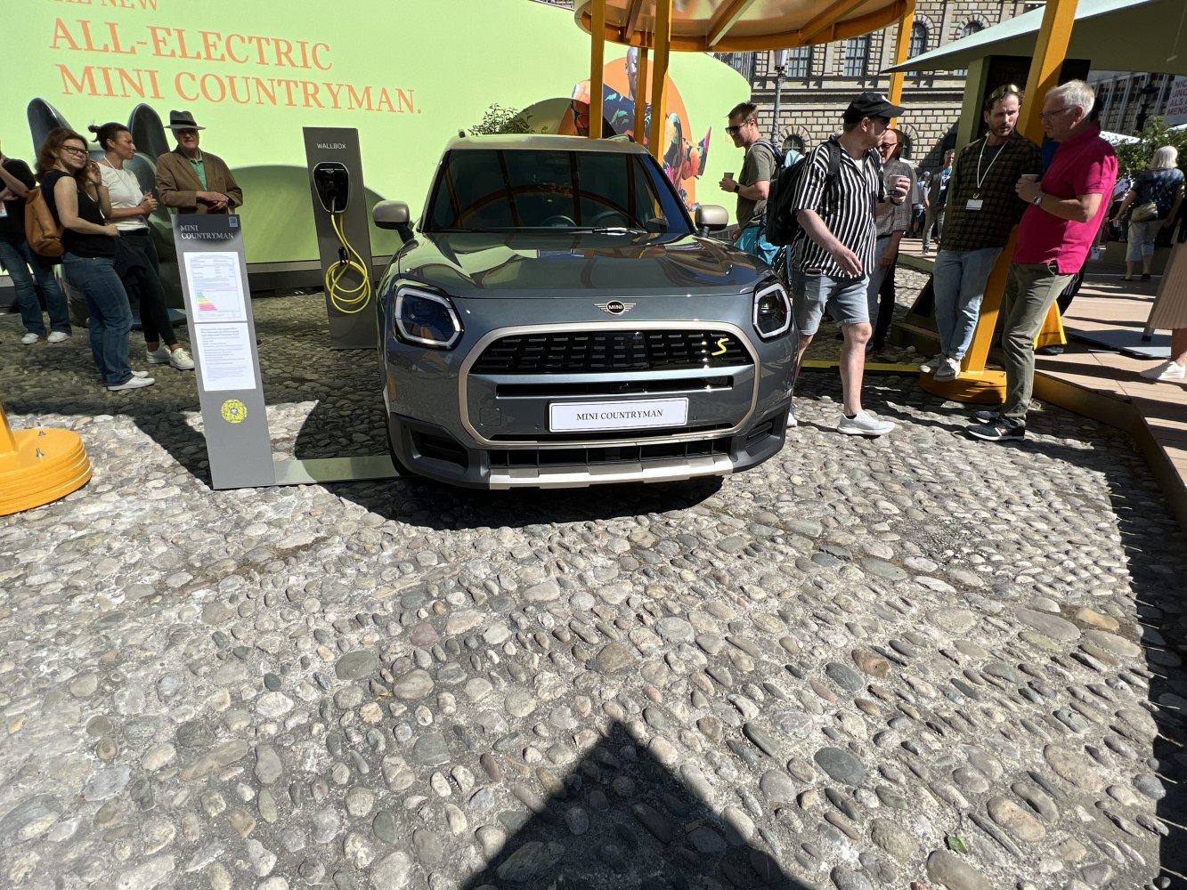 Front view of Mini Countryman with LED headlights and charging station