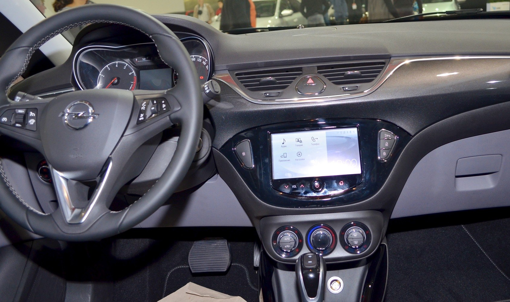 Steering wheel, touchscreen infotainment, and dashboard controls interior