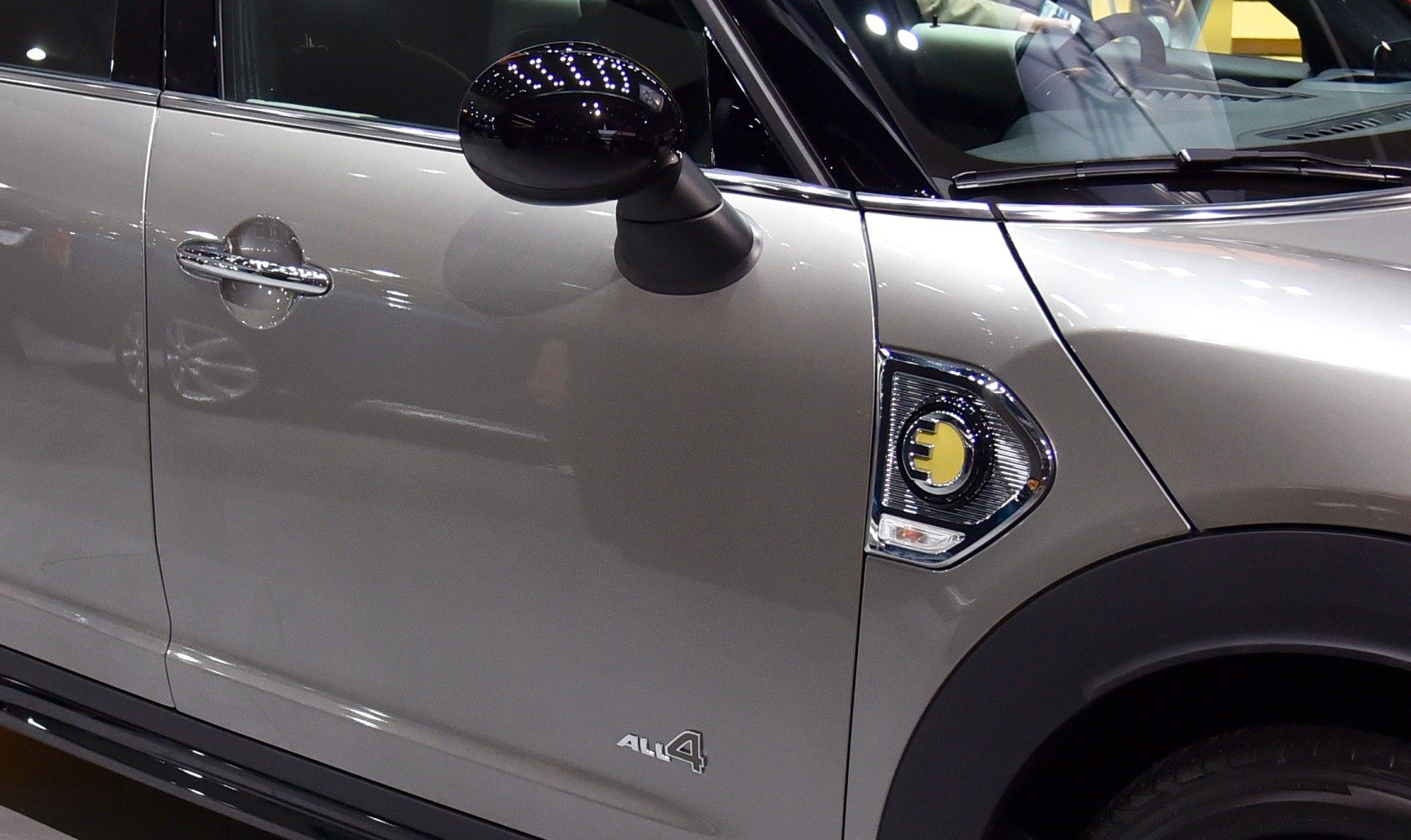 Electric side badge and ALL4 AWD emblem on vehicle door