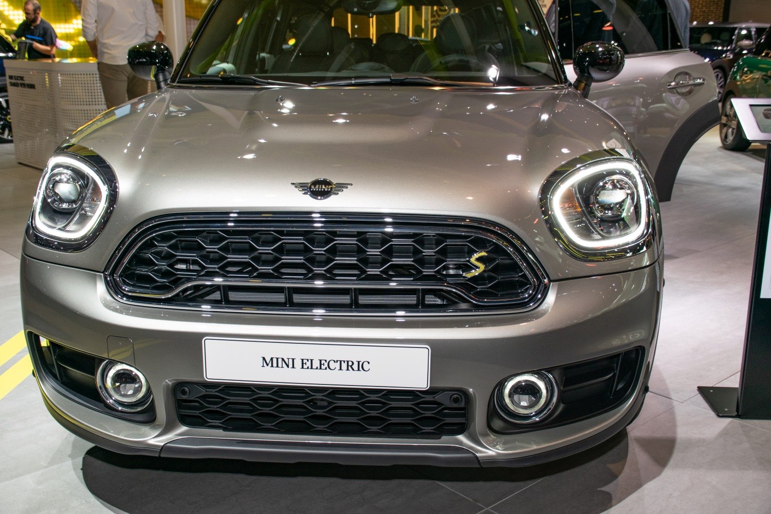Front view with LED headlights, honeycomb grille, and fog lights