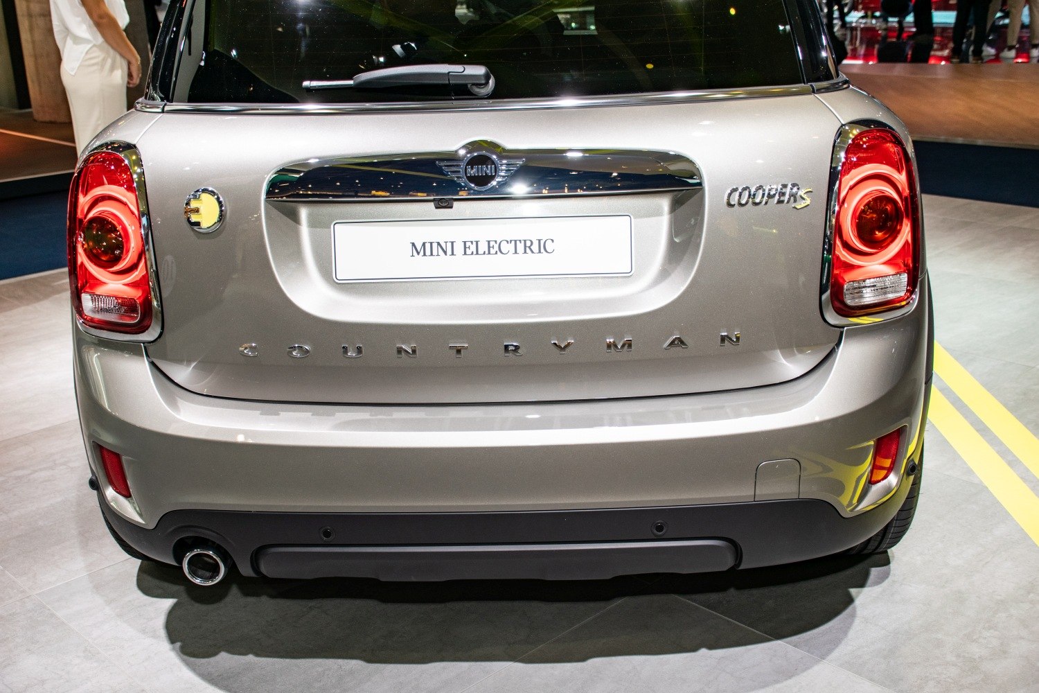 Rear view with tail lights and electric badge.