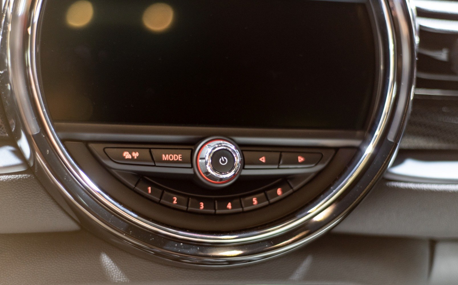 Infotainment control panel with mode and preset buttons
