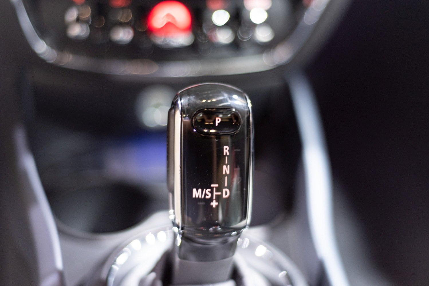 Close-up of an automatic transmission gear shift lever with PRND and M/S modes