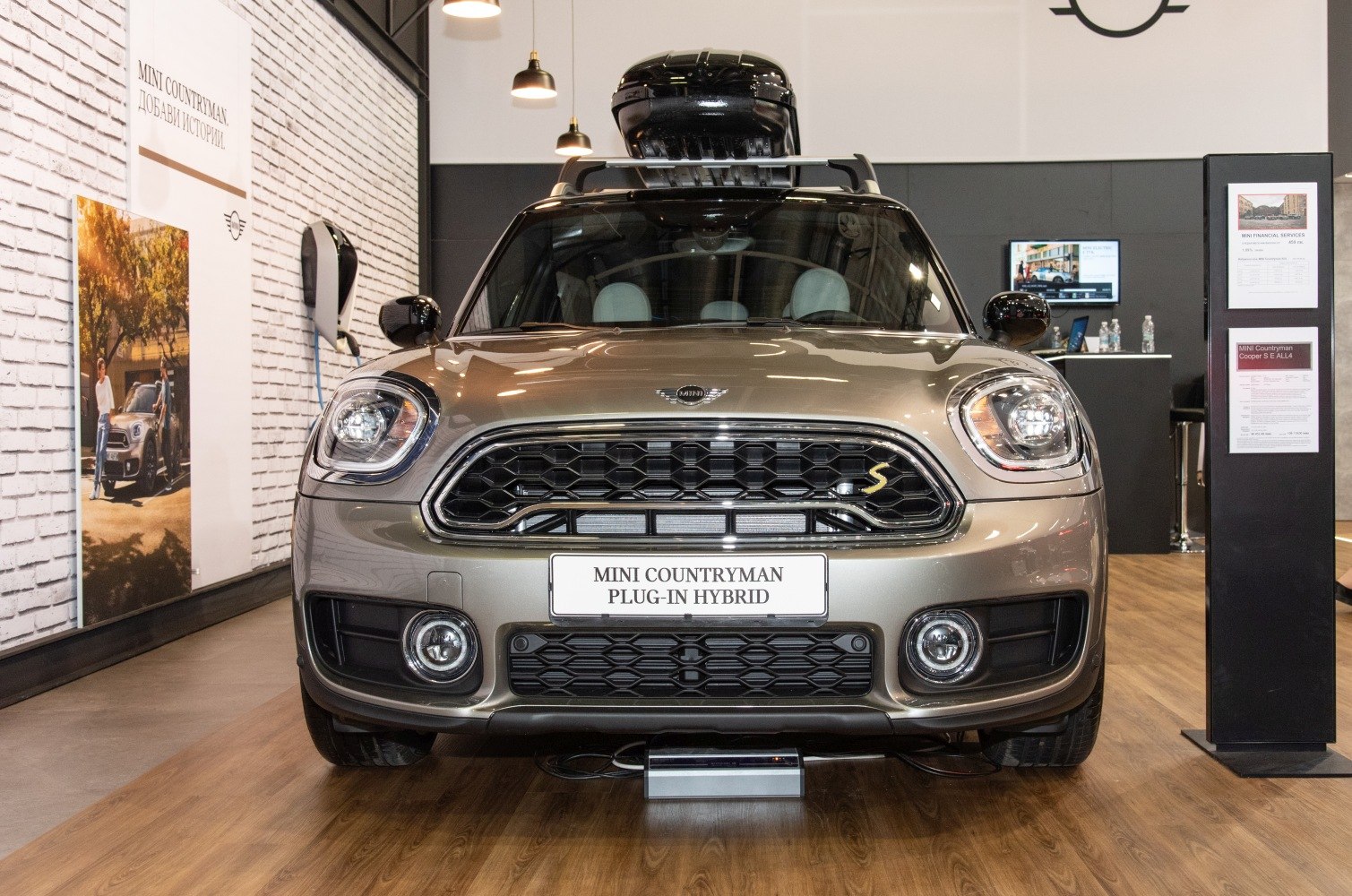 Front view of plug-in hybrid with roof box and detailed grille