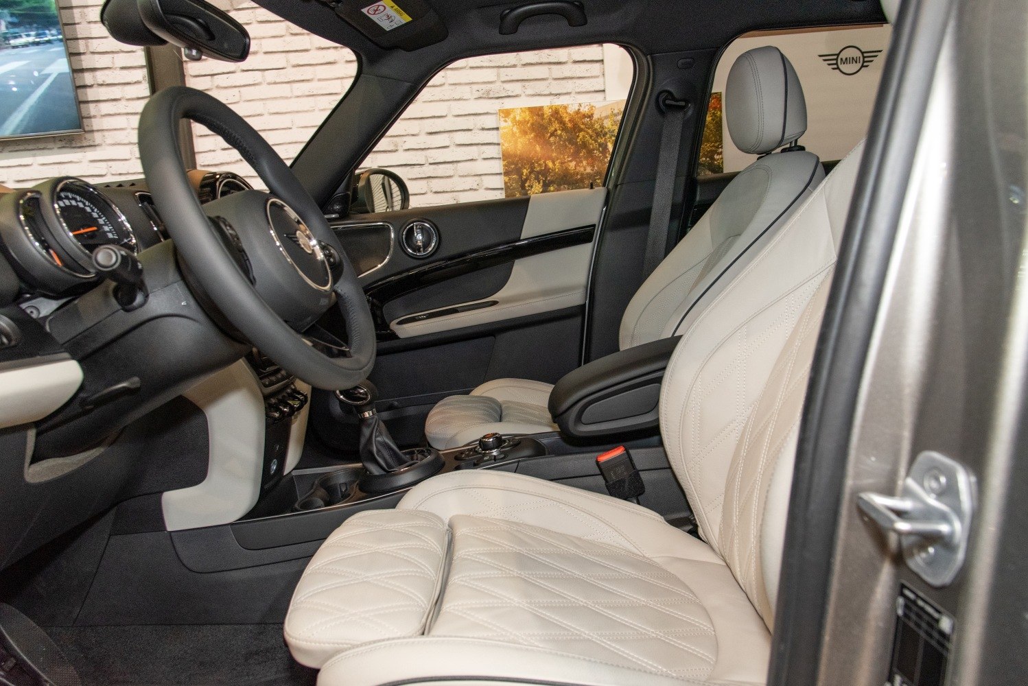 Quilted leather seats and dashboard with steering wheel