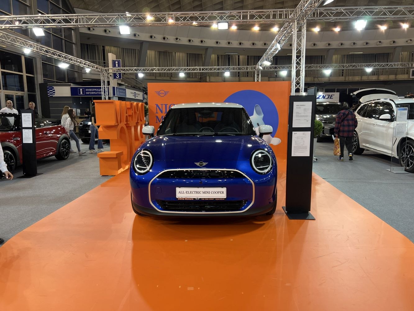 Front view with circular LED headlights and distinctive grille design