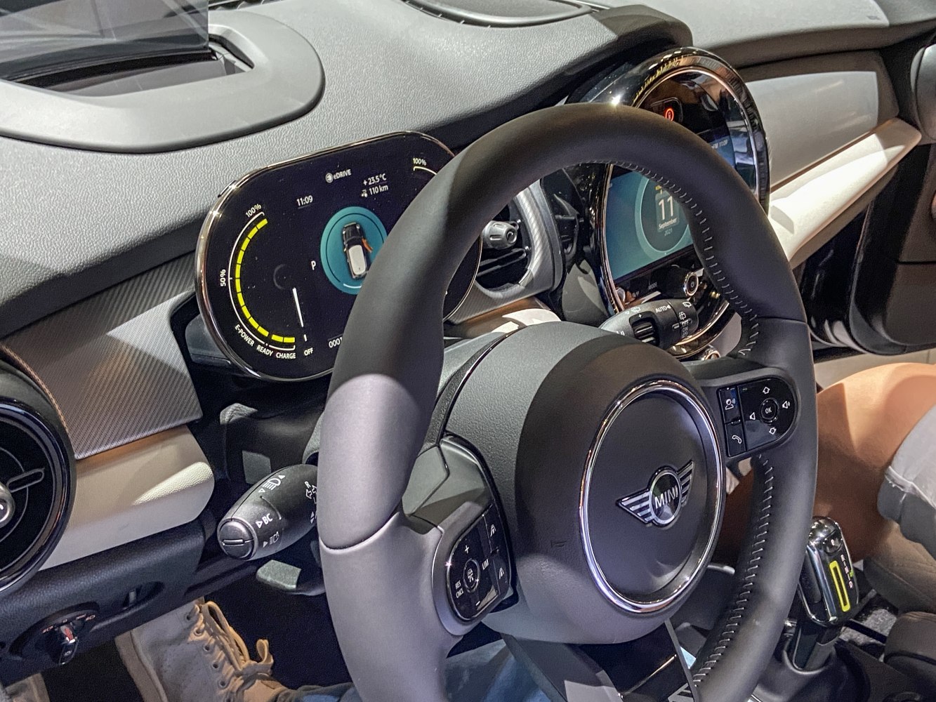 Digital instrument cluster and multifunction steering wheel in electric vehicle interior