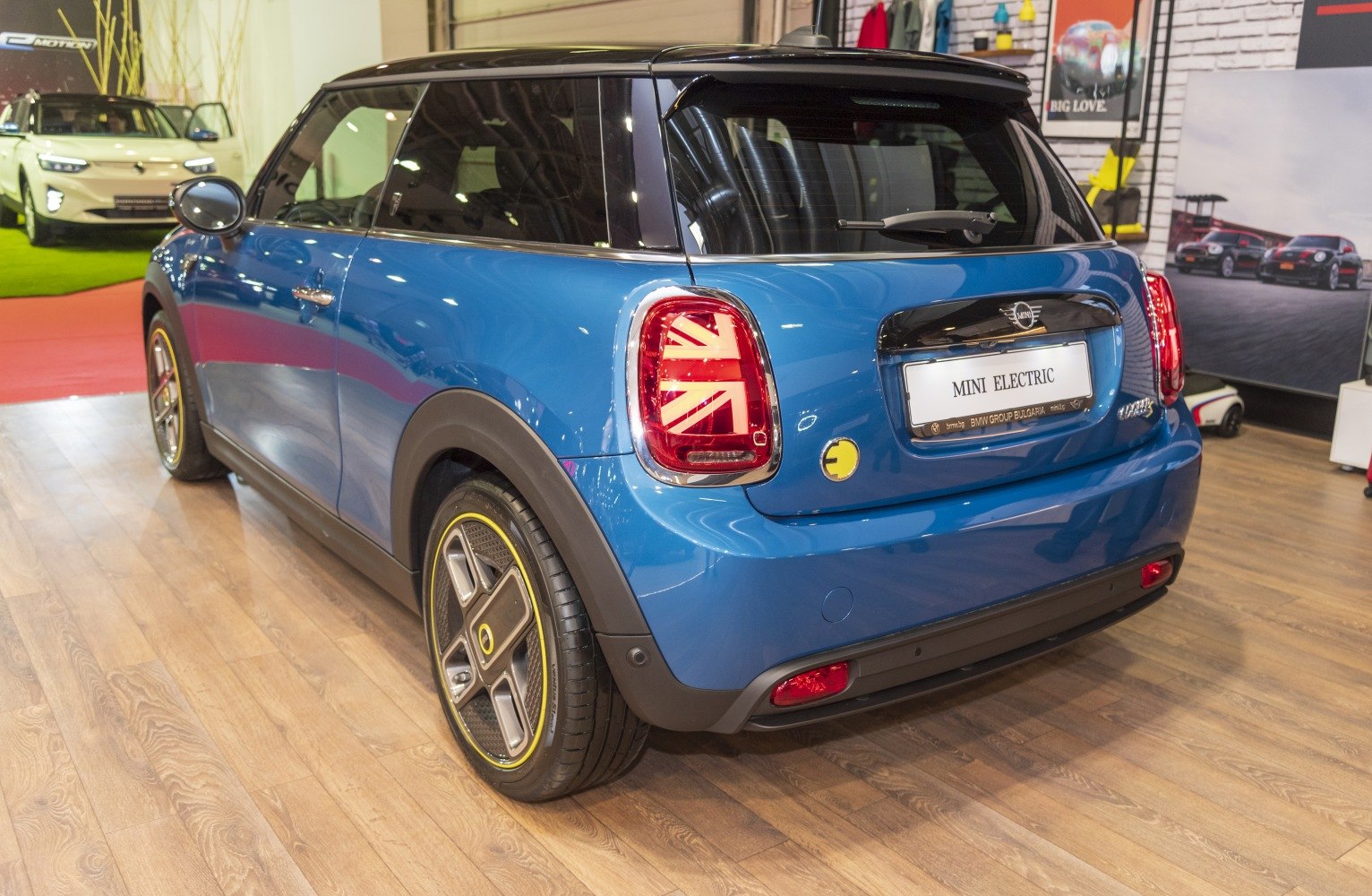 Rear view with Union Jack tail lights and electric-specific design details