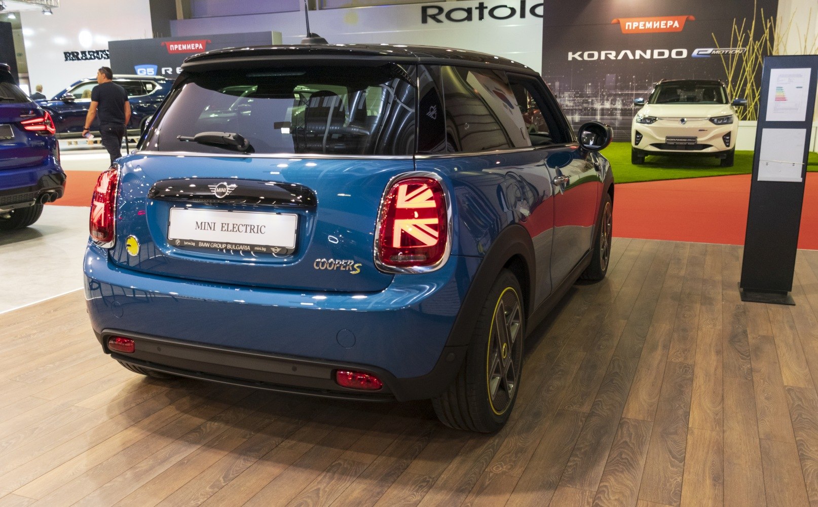 Rear view with Union Jack tail lights and modern hatchback design