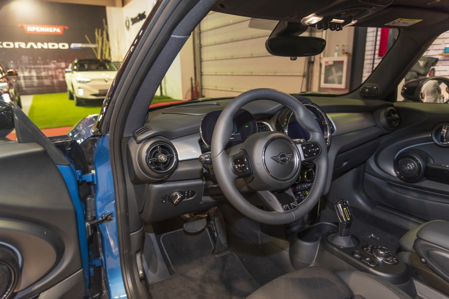 Modern car interior with digital cockpit and circular air vents