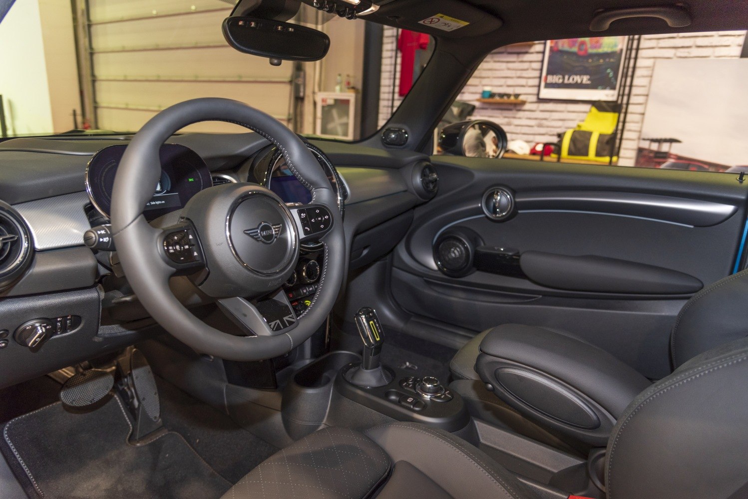 Steering wheel, digital dashboard, center console of car interior