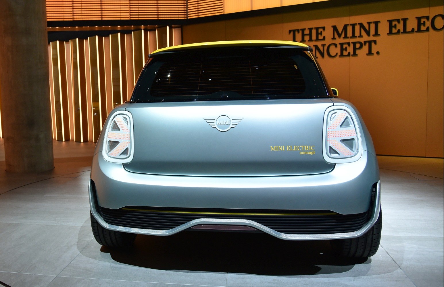 Rear view with unique triangular tail lights and sleek design