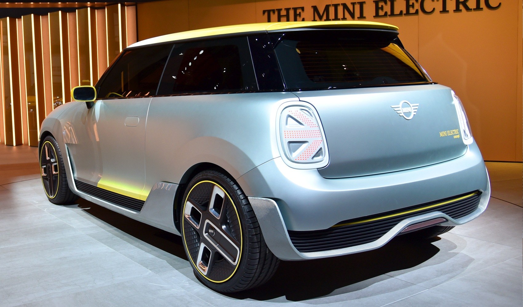 Rear view with Union Jack taillights and distinctive futuristic alloy wheels