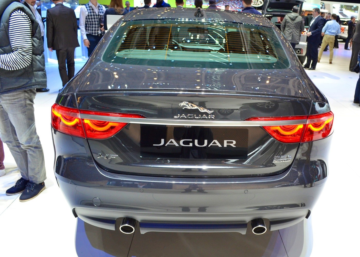 LED tail lights with distinctive circular pattern and dual exhaust tips at rear.