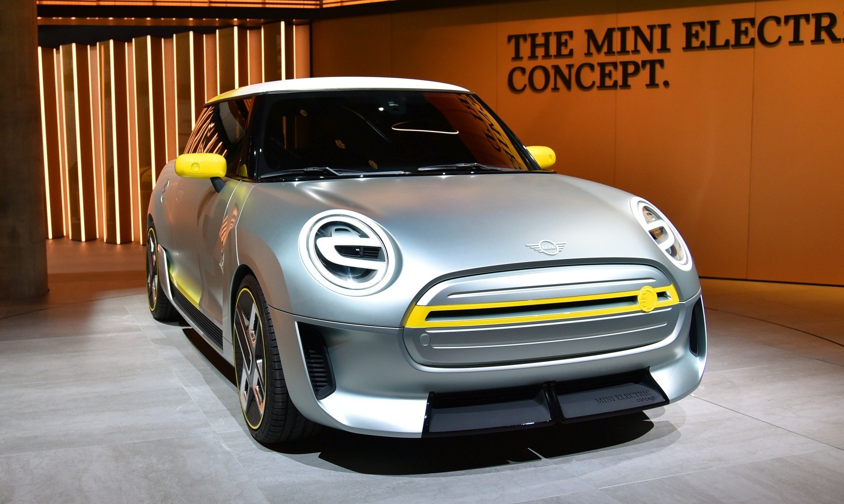 Futuristic LED headlights and yellow-accented front design