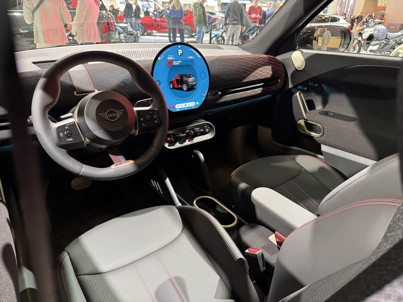 Modern digital dashboard and multifunction steering wheel with premium seats