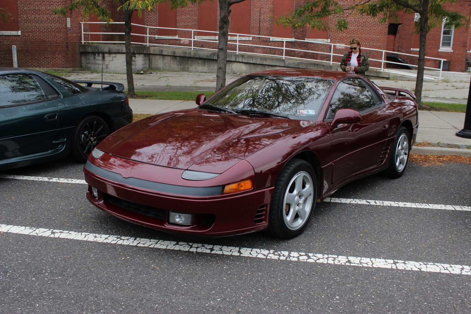 Front-side view showing pop-up headlights and sleek body design.