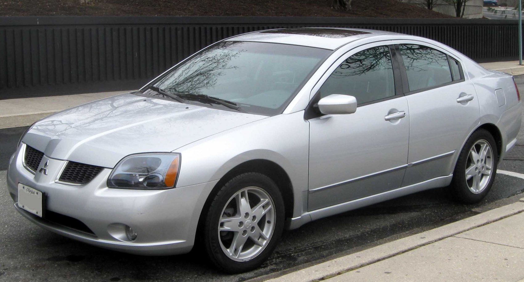 Silver sedan with alloy wheels and front side view
