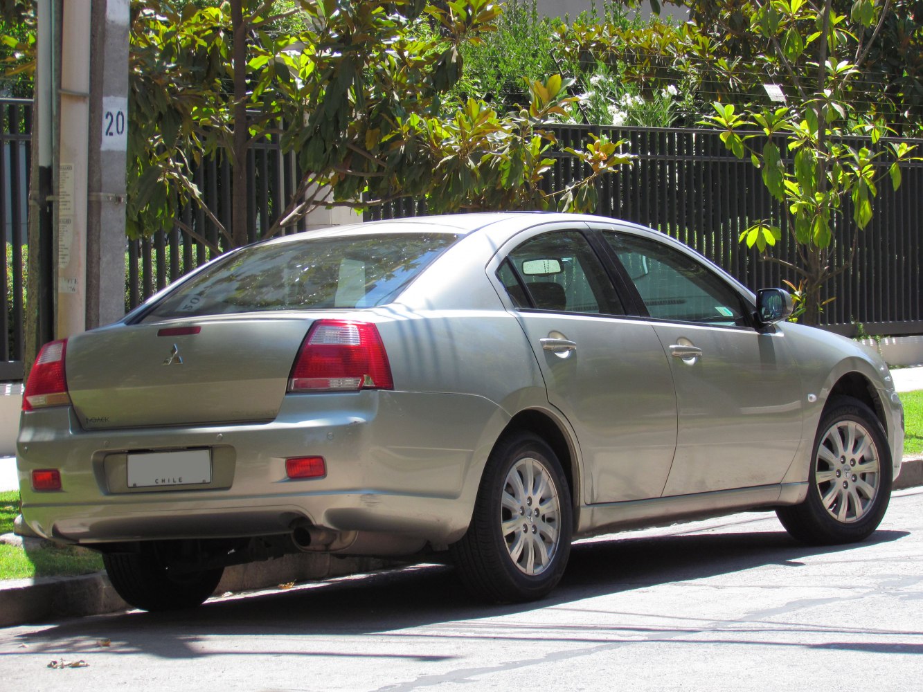 Rear view of a sedan with distinct taillights and smooth body lines
