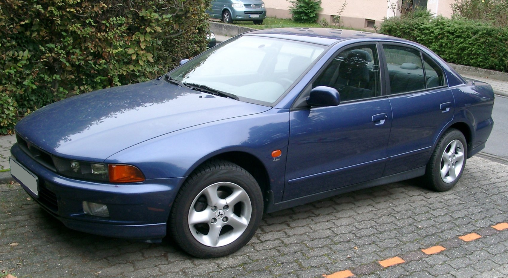 Four-door sedan with alloy wheels and streamlined body shape