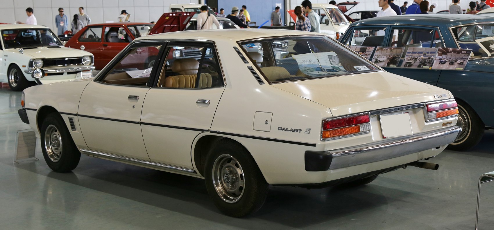 Classic vintage four-door sedan rear side with rectangular tail lights