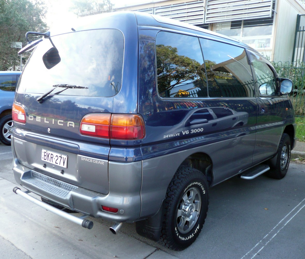 Rear and side view of van with 24V V6 3000 badge and off-road tires