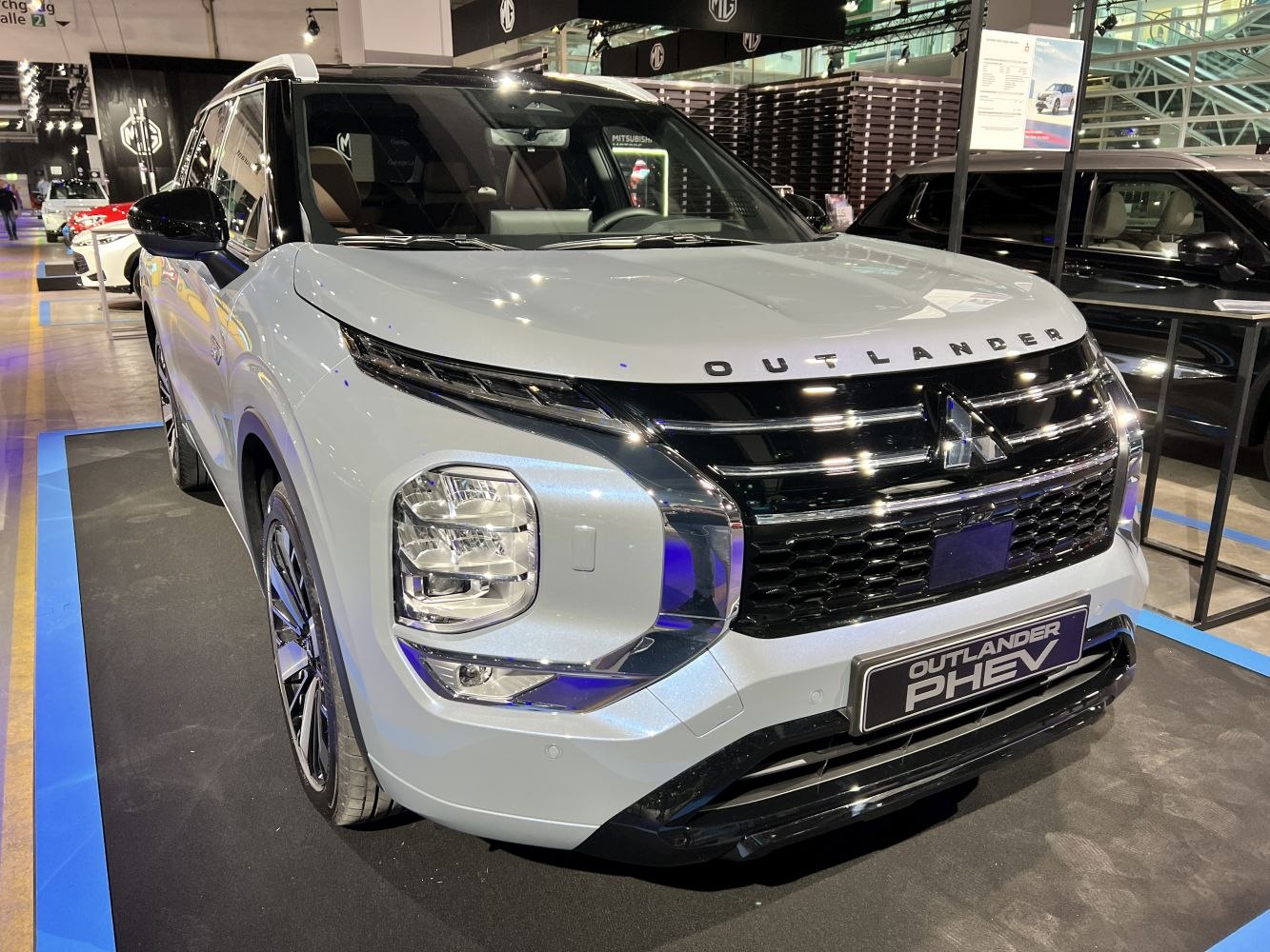 Front view with headlight cluster and prominent chrome grille