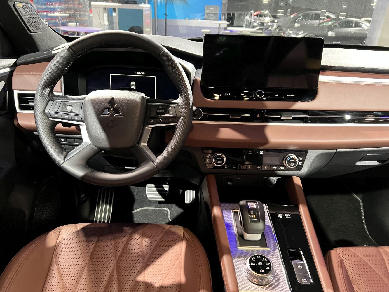 Modern car interior with digital instrument cluster and large infotainment screen