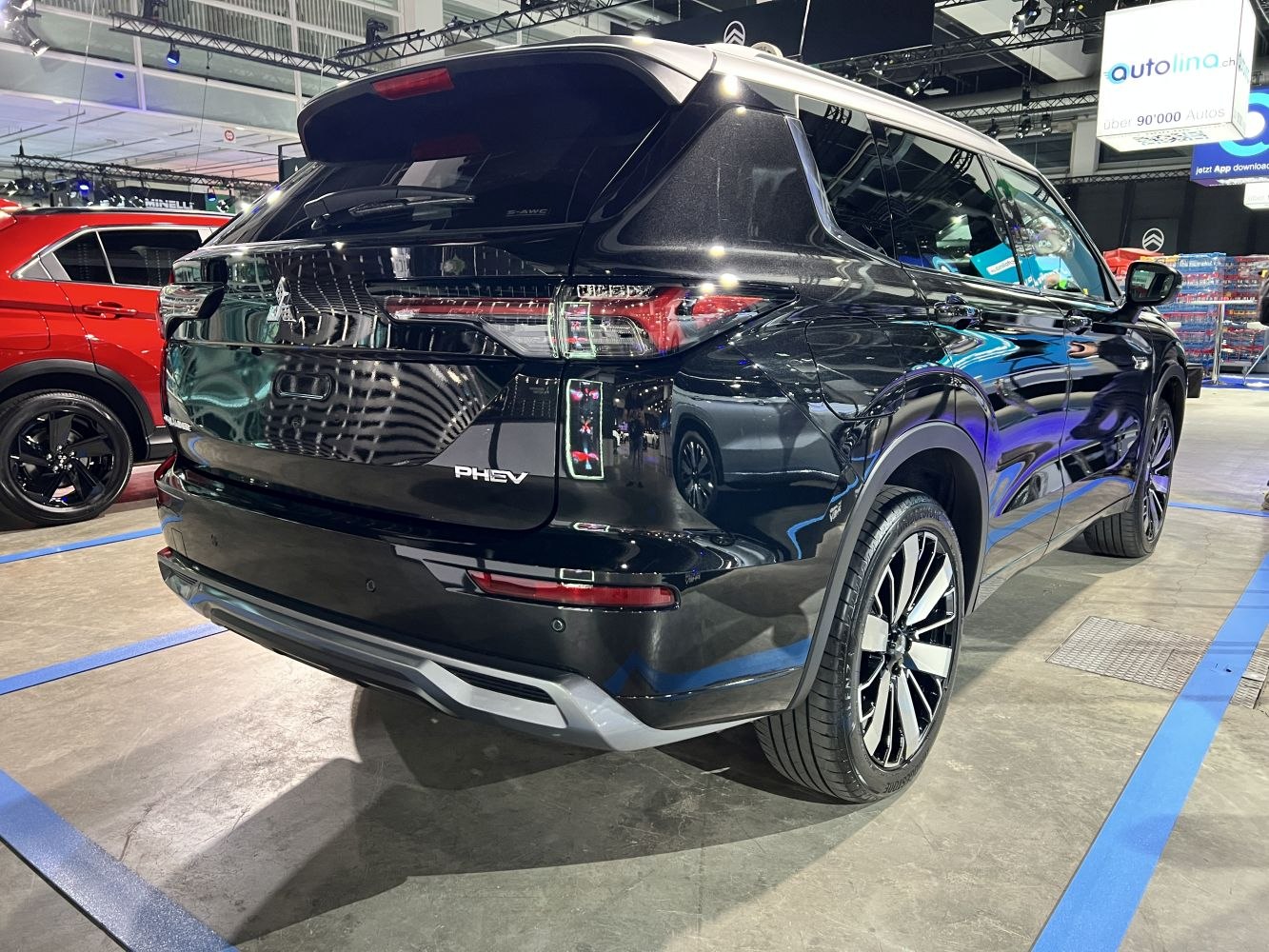 Rear and side view of PHEV SUV with alloy wheels and modern tail lights