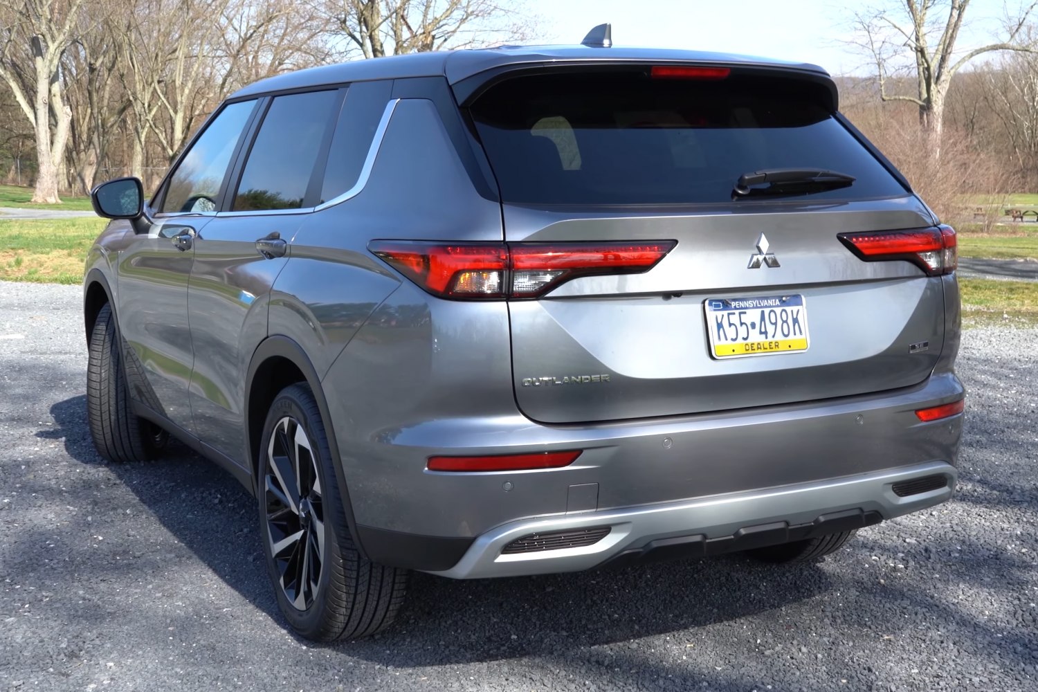 Rear view of SUV with LED tail lights and dual exhausts