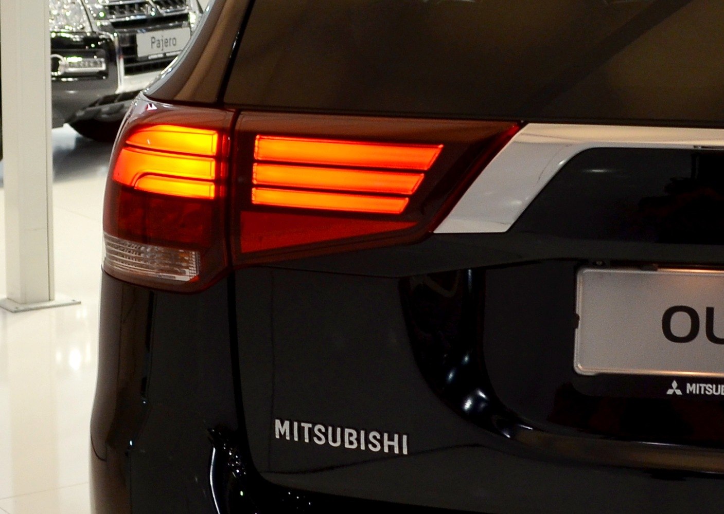 Close-up of the tail light design with three horizontal LED light bars.
