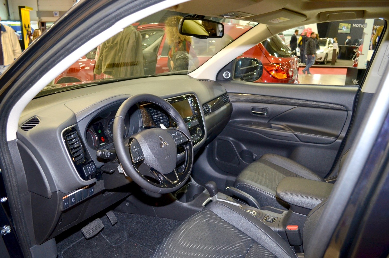 Dashboard, steering wheel, infotainment system and front seats in car interior