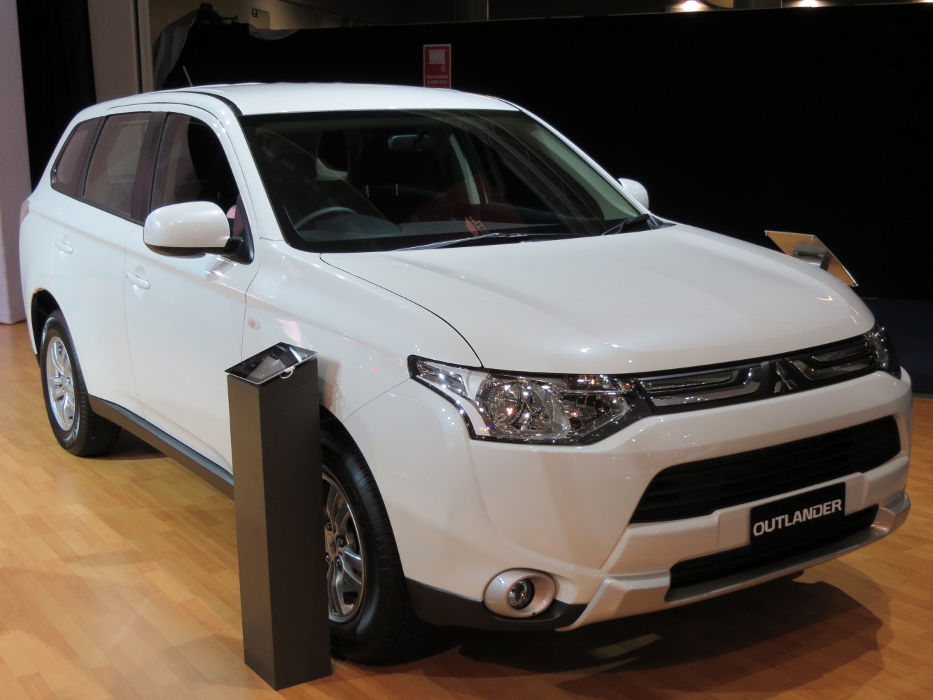 Front view of SUV highlighting headlight and grille design