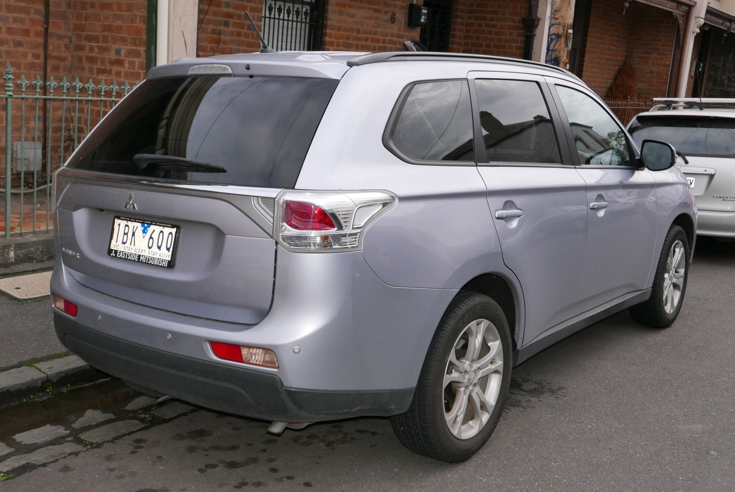 Rear view of an SUV with modern tail light design and alloy wheels