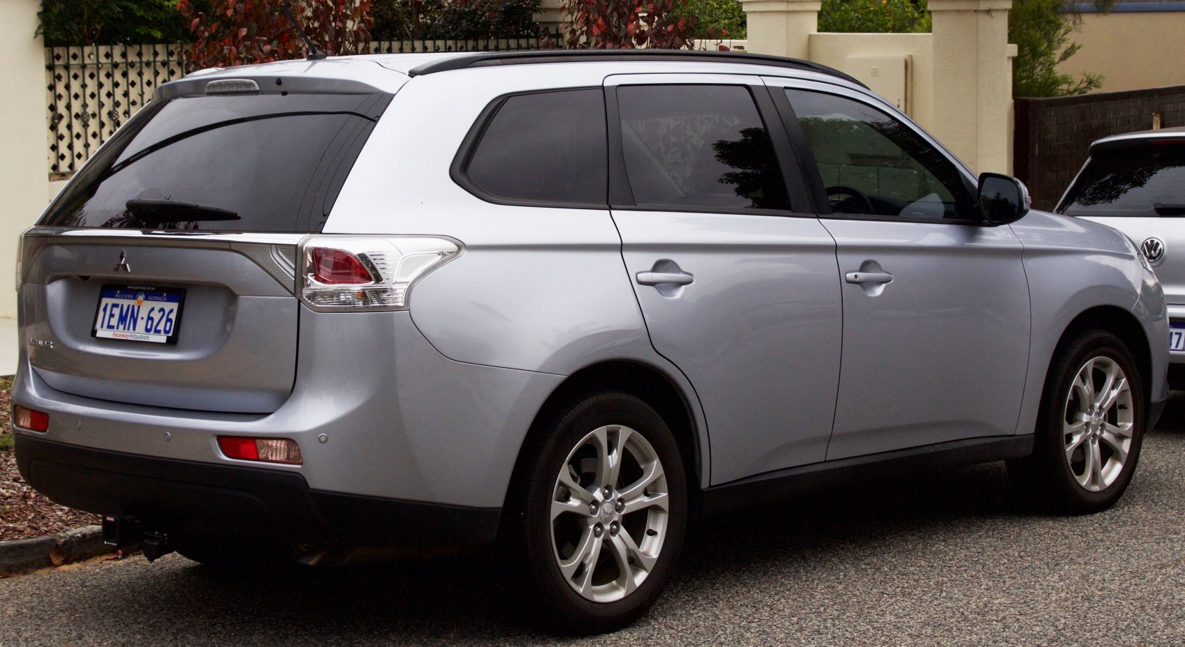 Silver SUV rear and side profile with alloy wheels and tinted windows