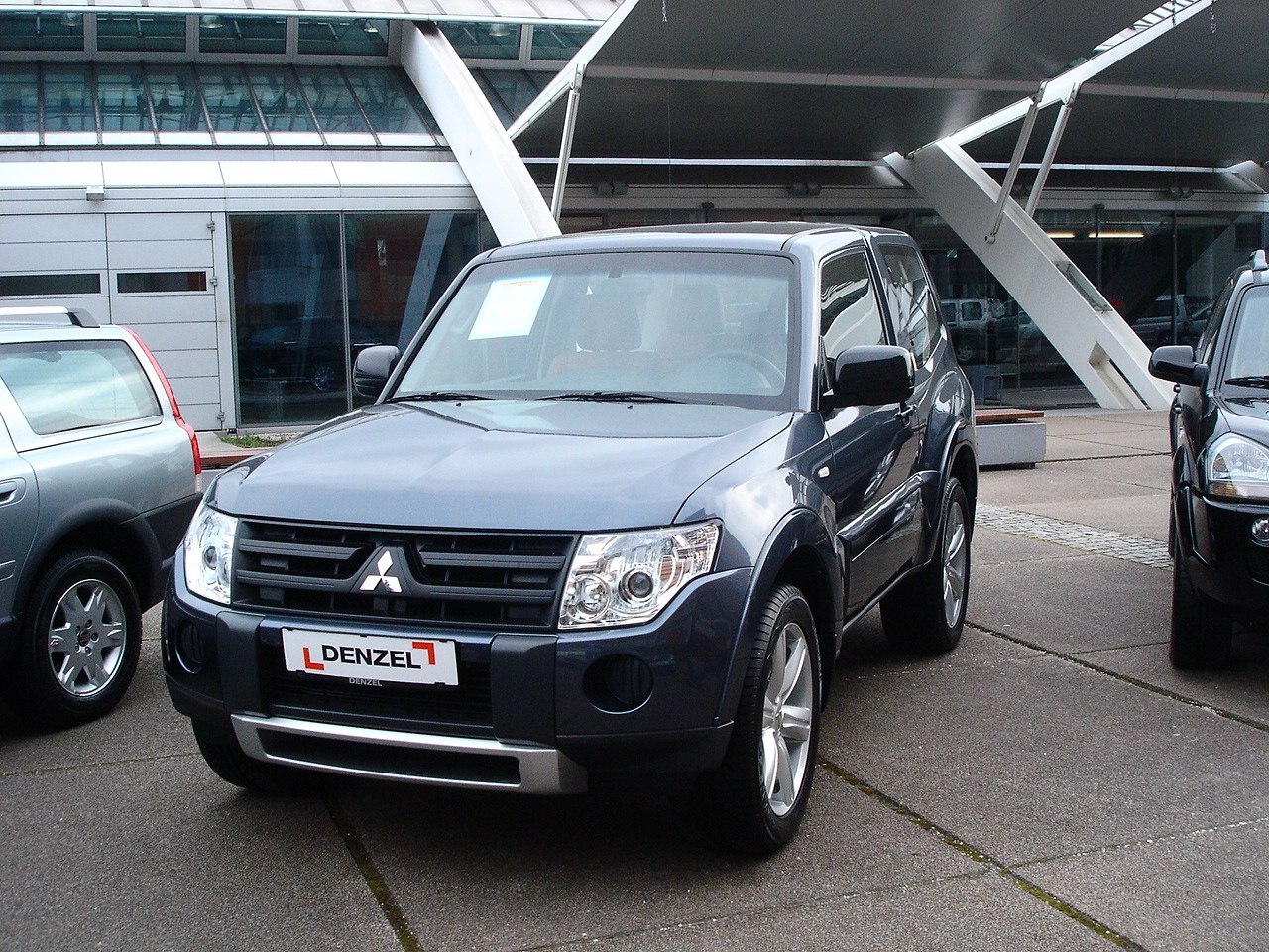 Front view of SUV with bold grille and prominent headlights