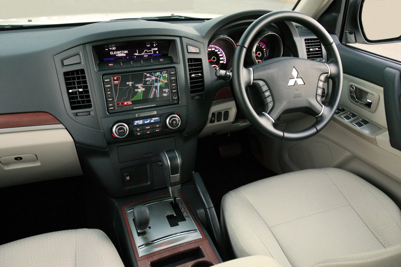 Interior dashboard with navigation and multifunction steering wheel