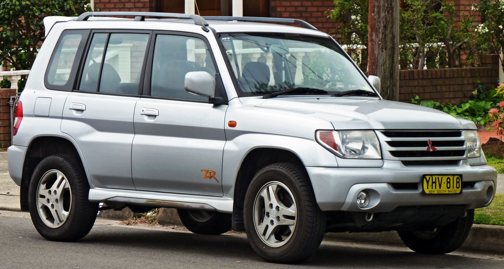 Silver SUV front-side view with ZR badge and grille