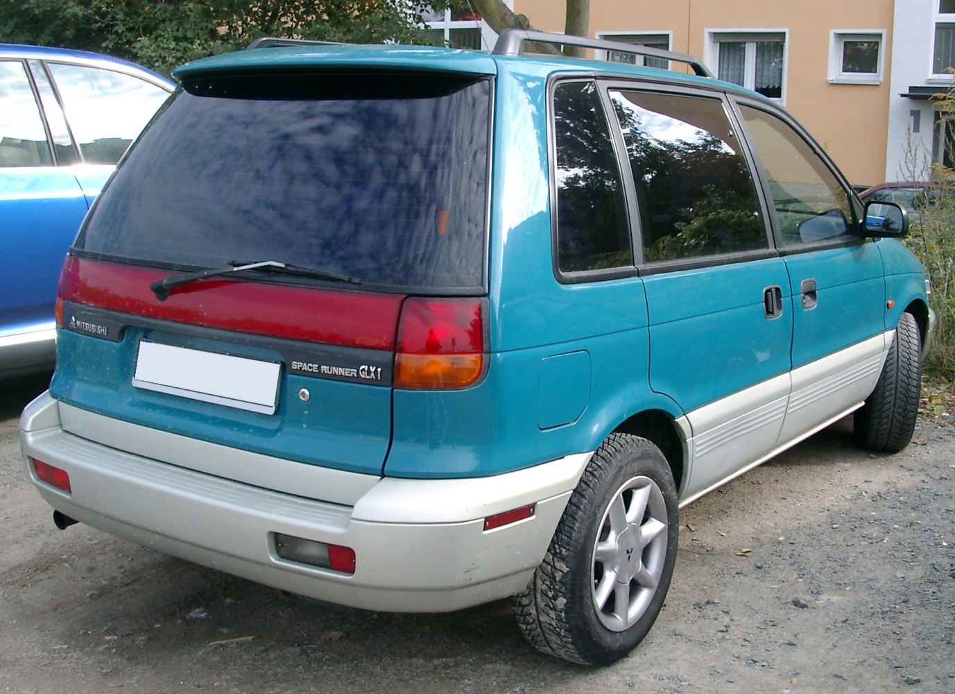 Rear and side view with tinted windows and taillights