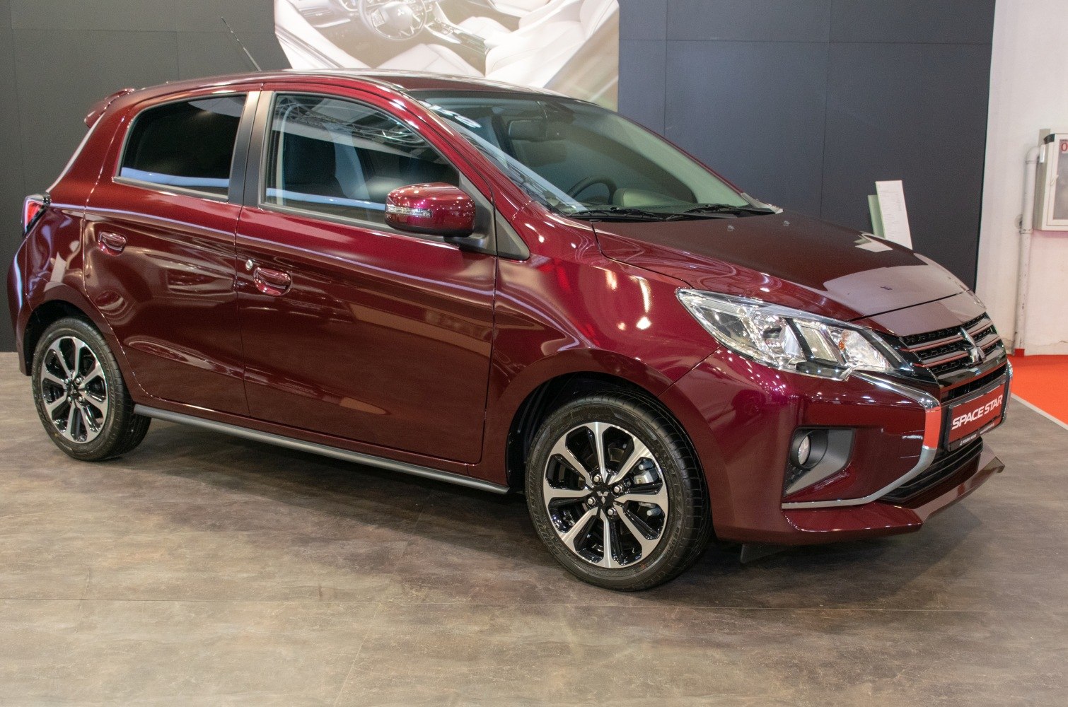 Front side view of facelifted compact hatchback with alloy wheels