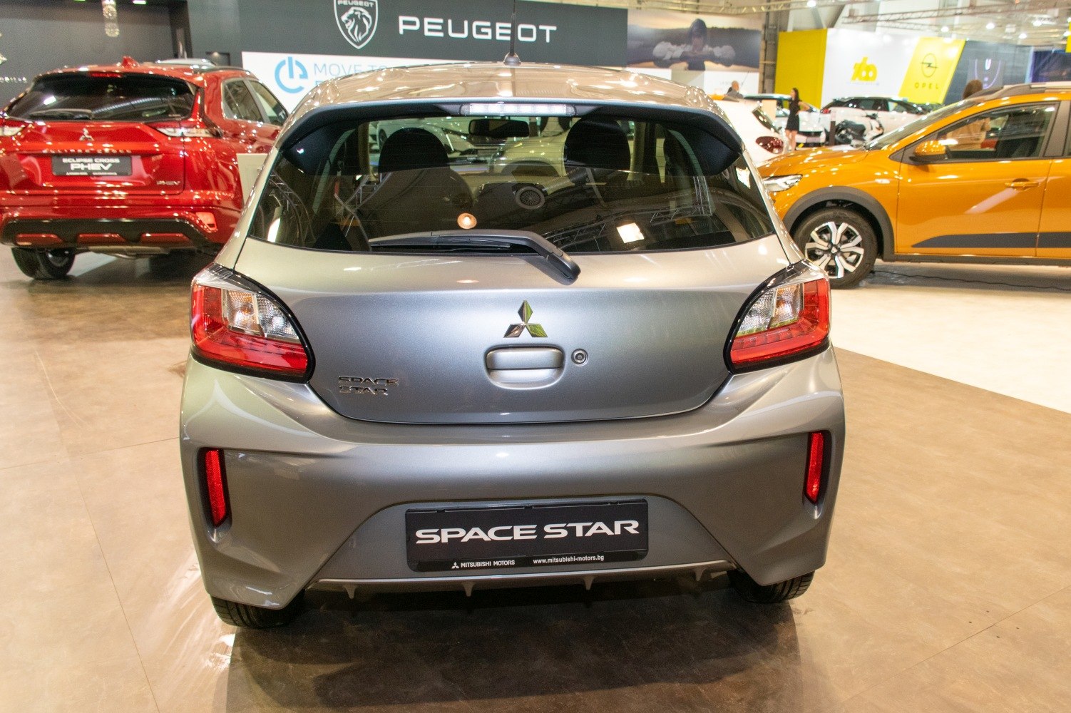 Rear view of a compact hatchback featuring updated taillights and hatchback door