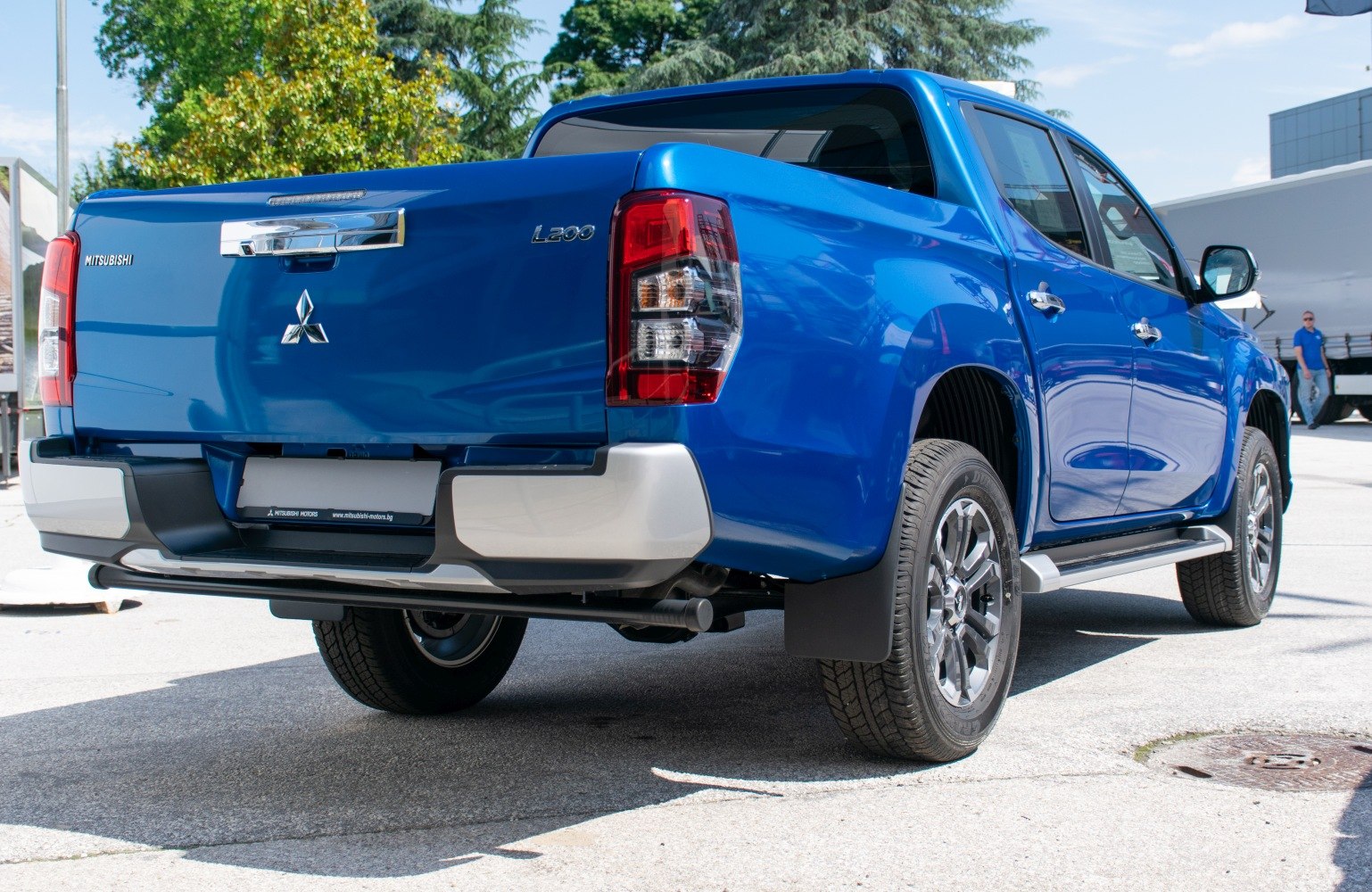 Pickup truck rear view with tailgate and rear lights