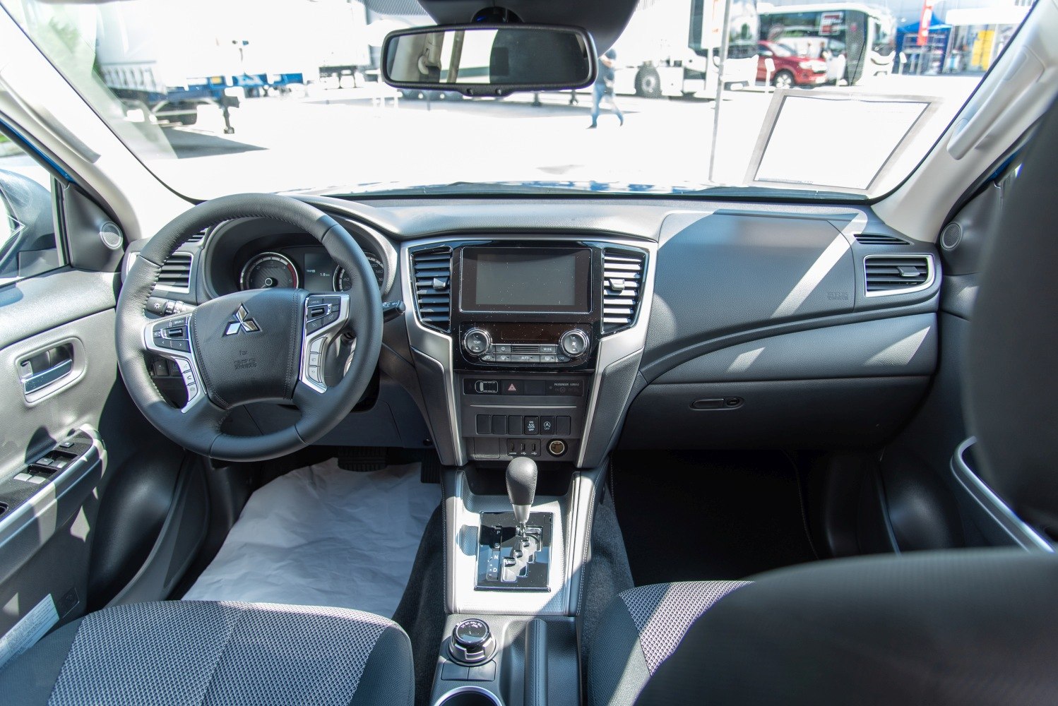 Dashboard and multifunction steering wheel of a modern pickup truck