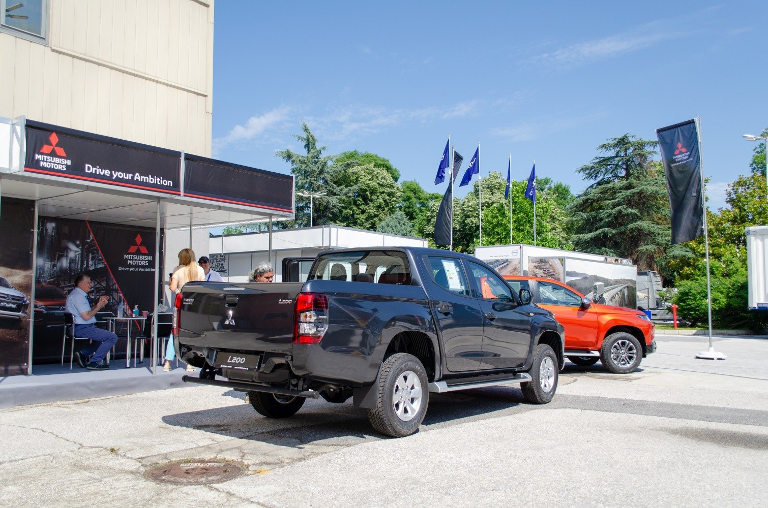 Rear and side view of a double cab pickup truck with a spacious bed and sturdy design