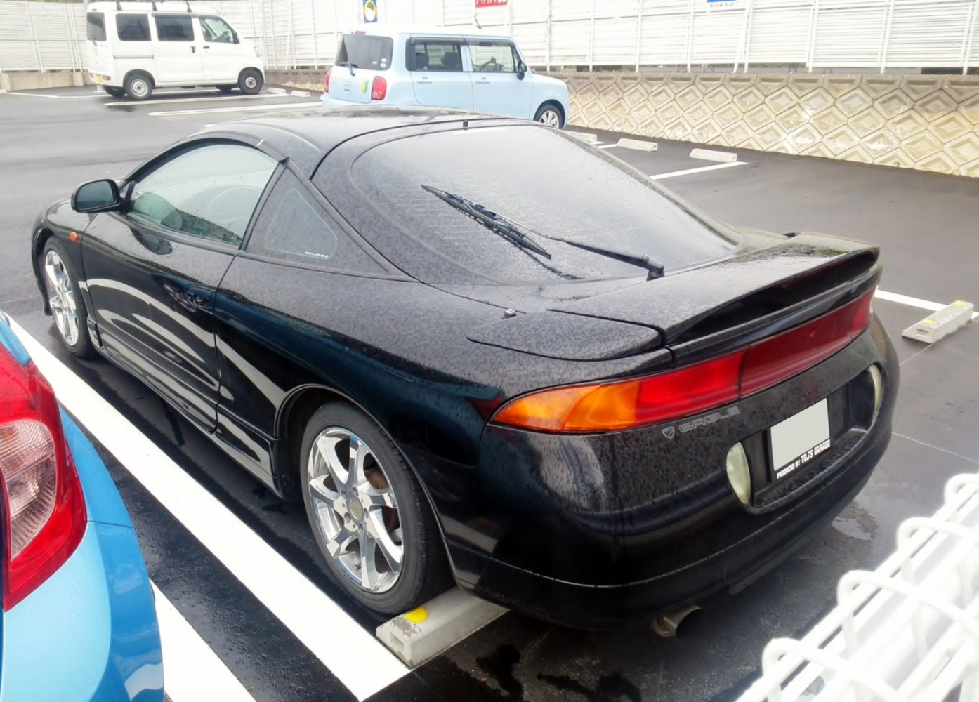 Sportback coupe rear and side view with spoiler and tail light design