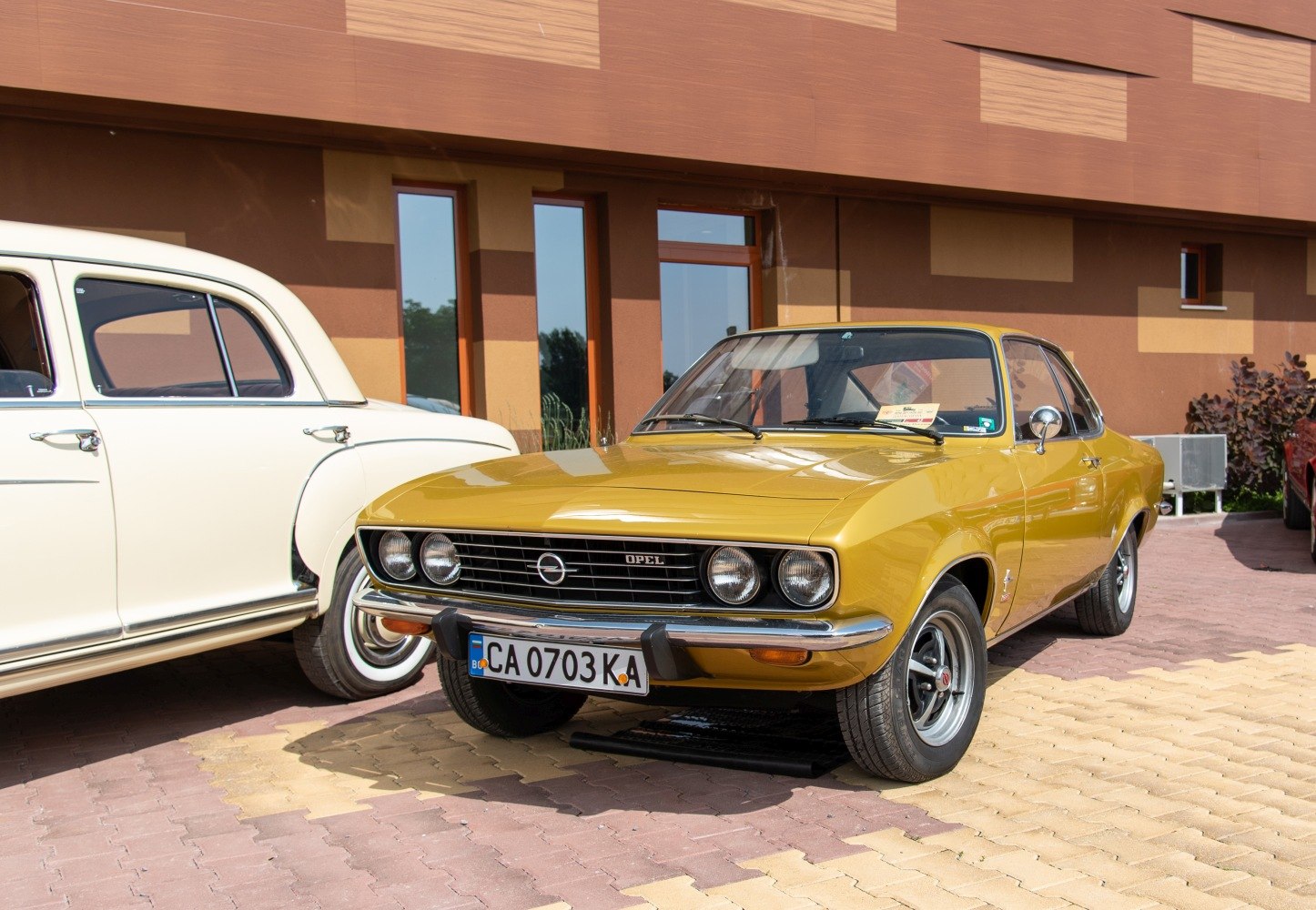 Front view with quad headlights and vintage grill