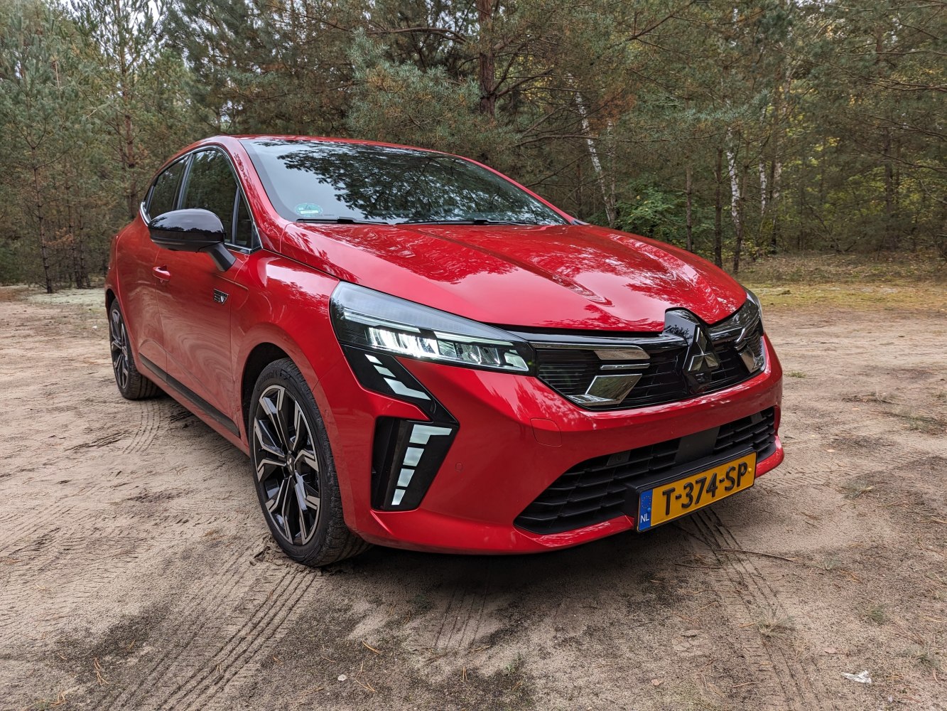 Front view with LED headlights and black grille design
