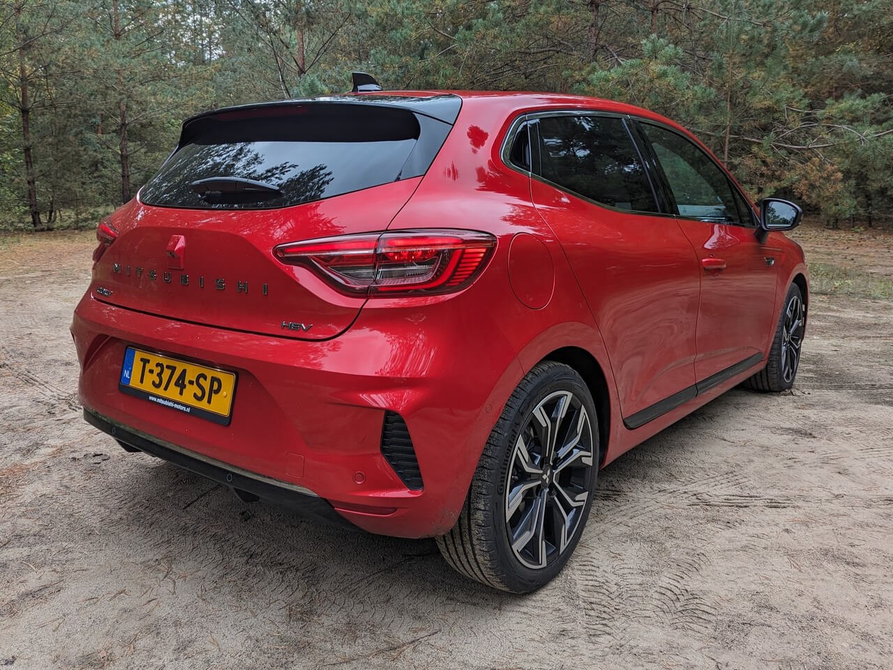 Red hatchback rear with LED taillights and alloy wheels
