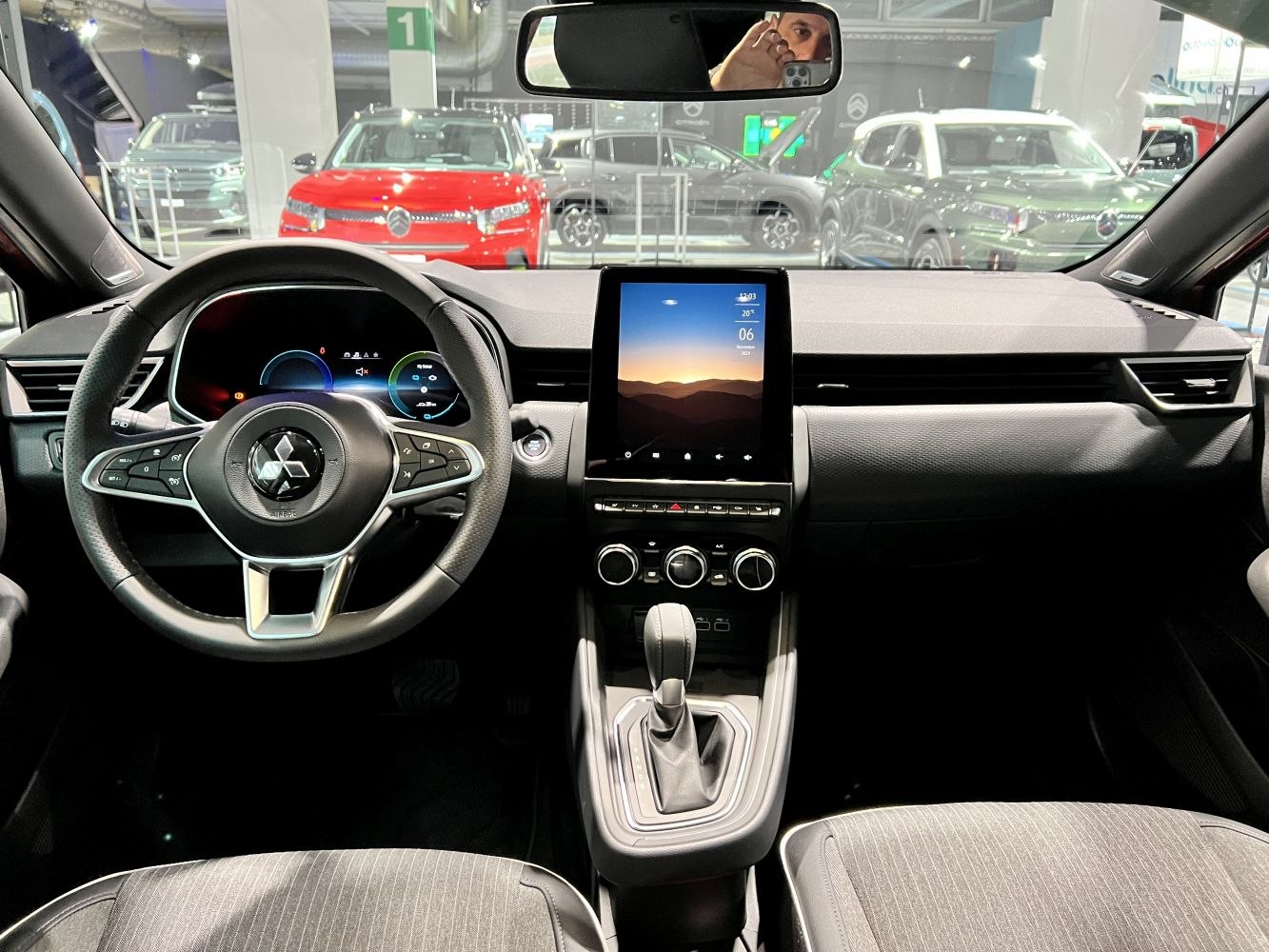 Digital dashboard, touchscreen center console, steering wheel controls
