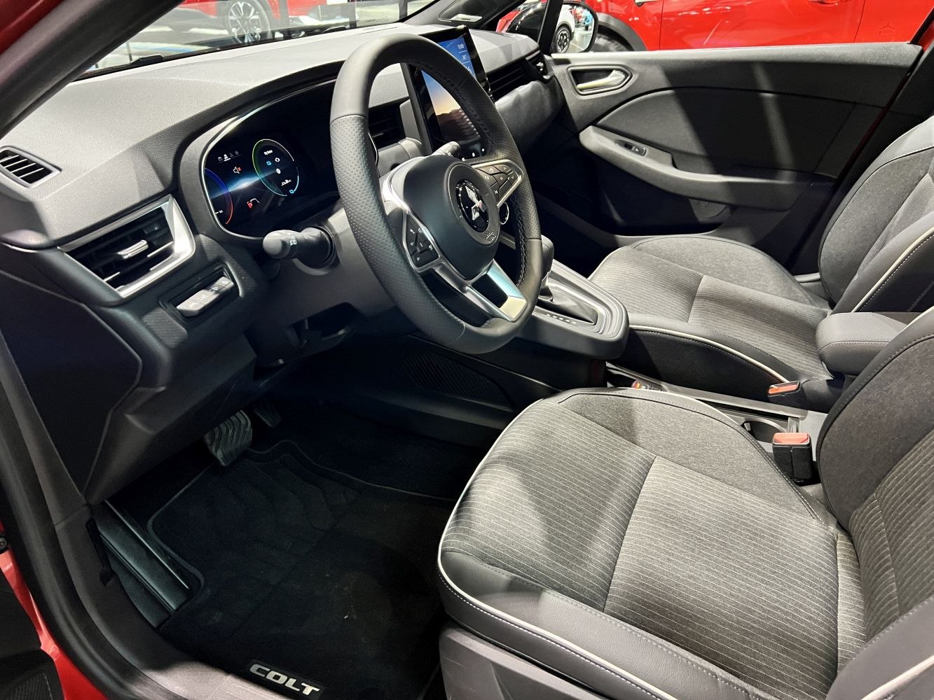 Modern digital dashboard and front seats with steering wheel